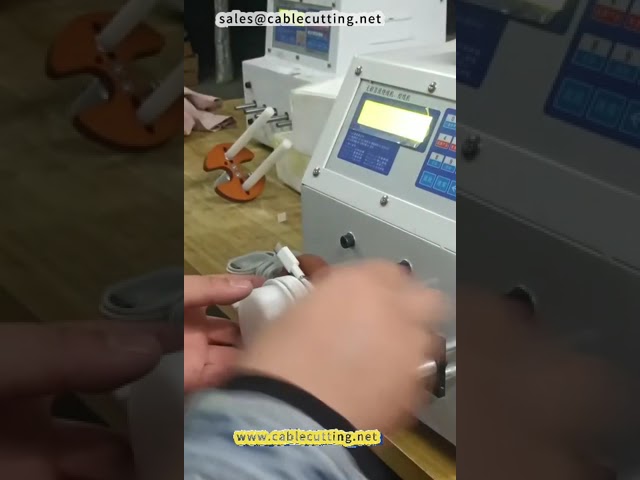 Macchina automatica per avvolgimento e legatura cavi dati